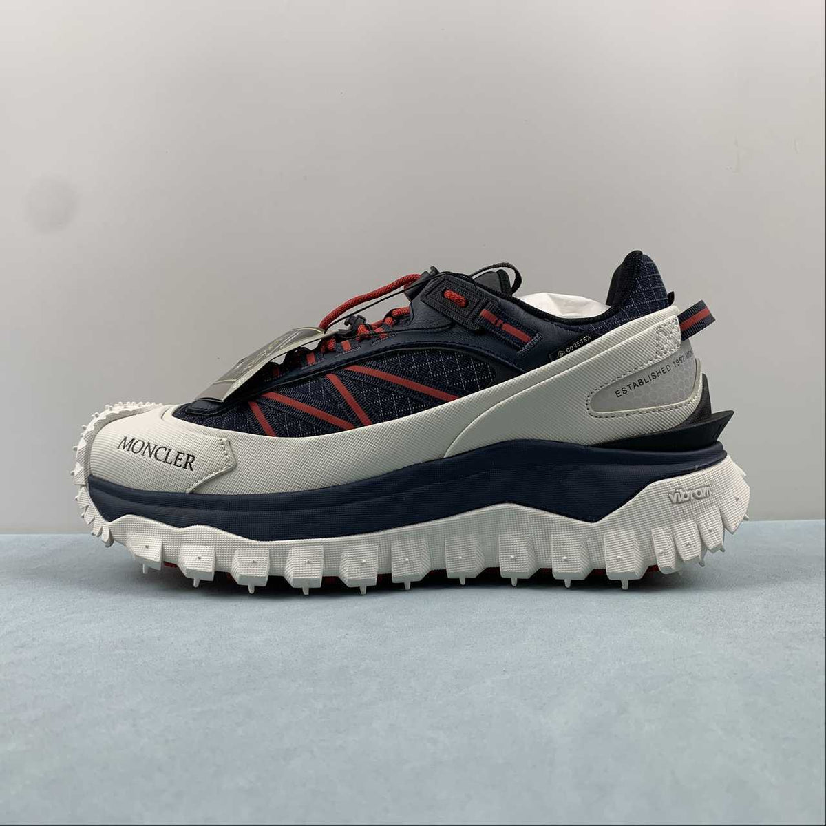 Moncler x Hoka Mafate Speed     Black & Cream Chunky Sneakers with Red Laces